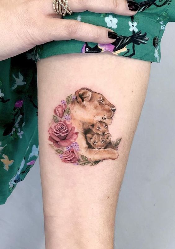 Full-Color Lioness, Cub, and Flowers Tattoo
