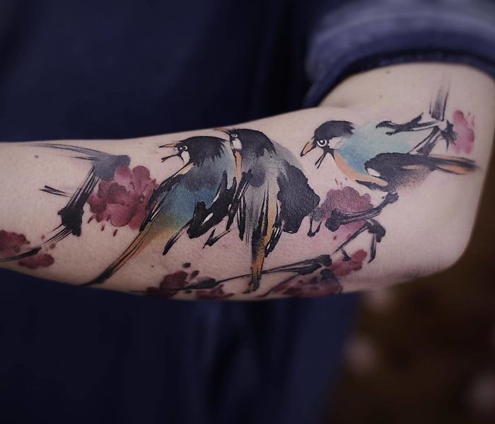 The Watercolor Birds on a Flowered Branch Tattoo Ideas