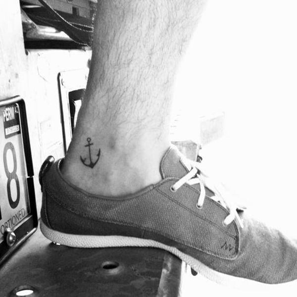 Small Simple Anchor ankle tattoo designs Placed Near Tendon