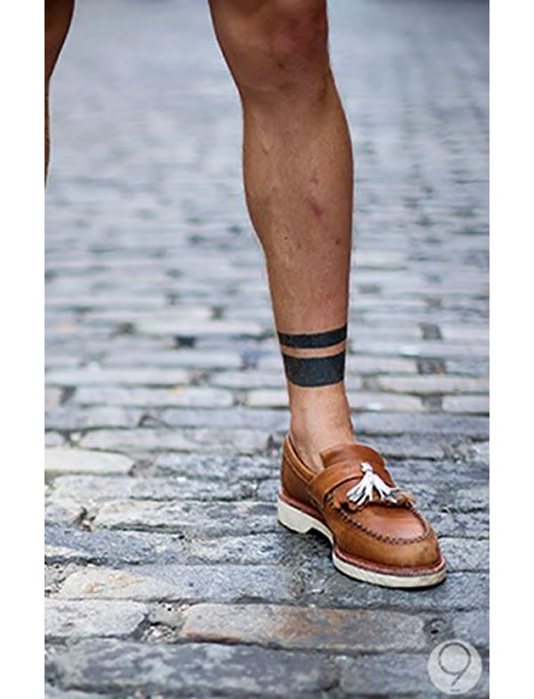 Bold Black Bands Circling ankle tattoos for Various Skin Tones