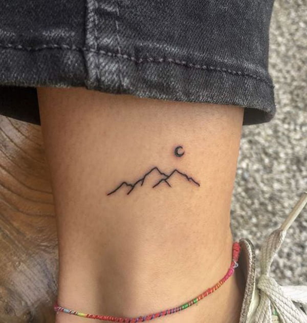 Line Work of Mountains and Moon, simple ankle tattoo