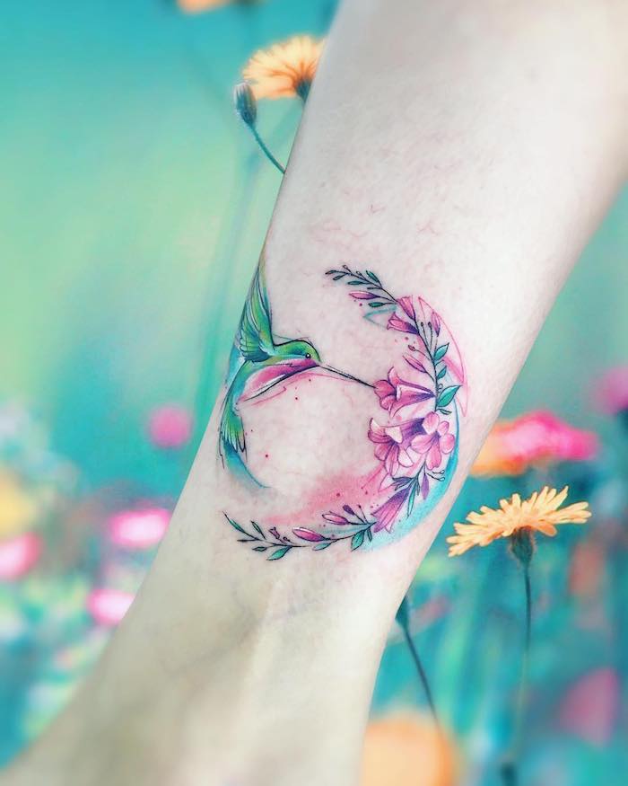 Hummingbird with Sprig of Flowers and Leaves cute ankle tattoo