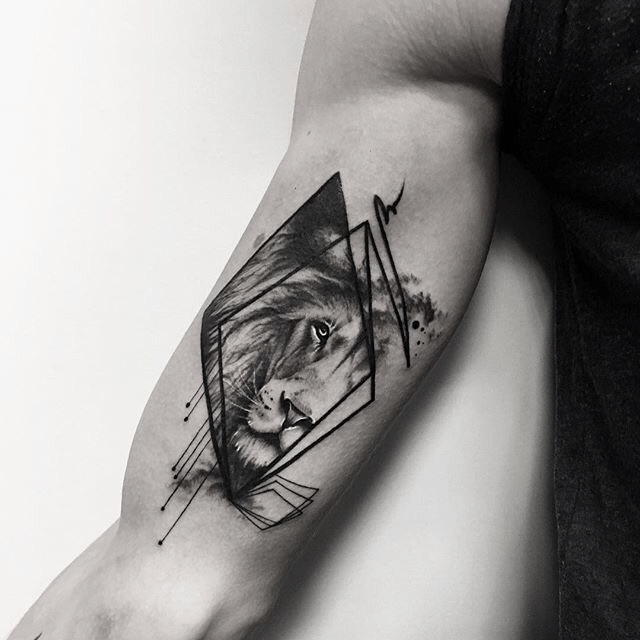 Lion Within Overlapping Diamond Shapes Bicep Tattoos