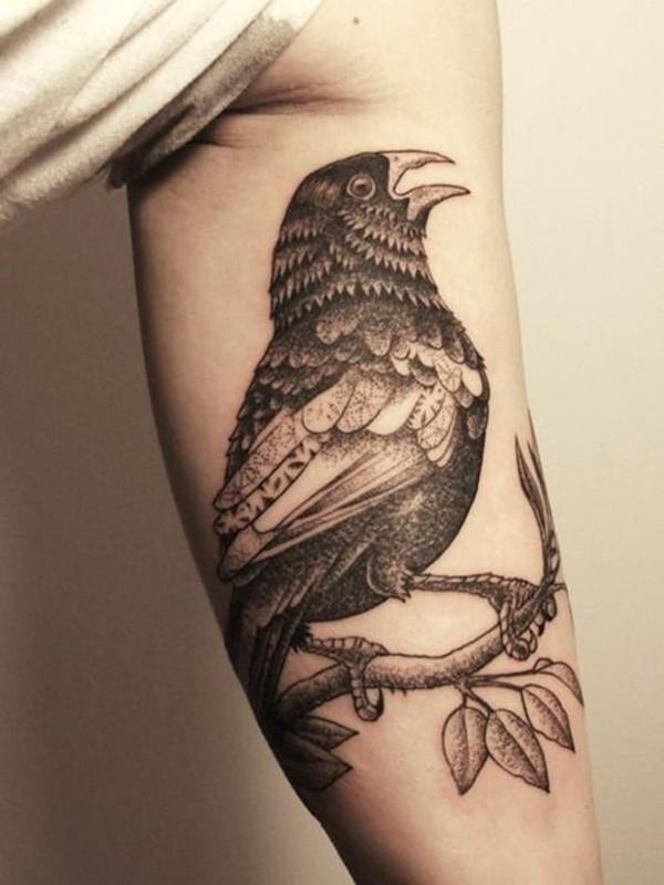 Small Black Bird on a Branch Inner Bicep Tattoos for Men