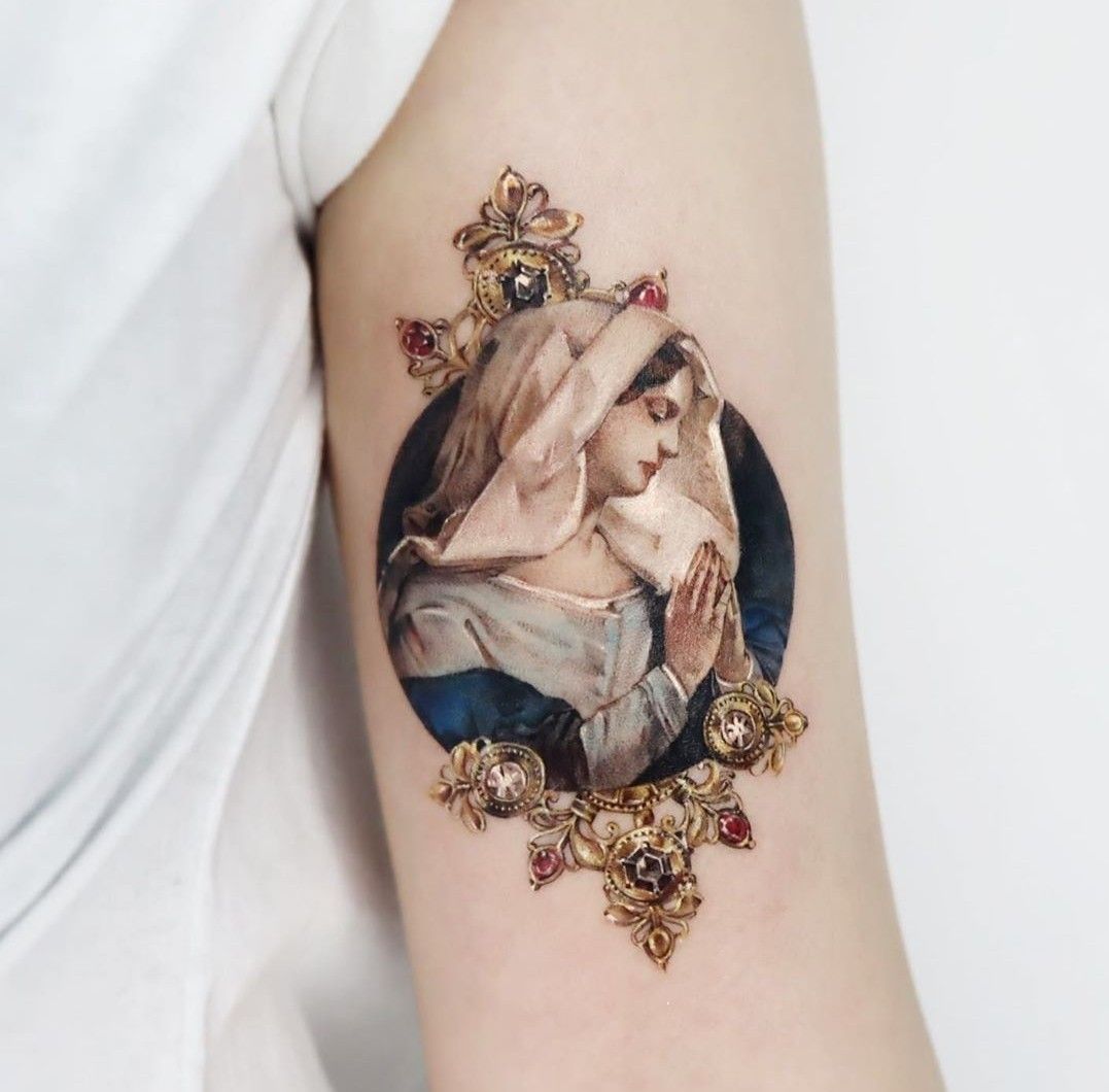 Praying Woman Surrounded by Jewels Inner Bicep Tattoos for Men