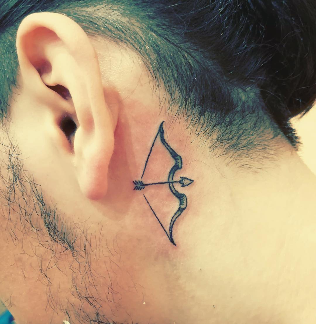Work Friendly Tattoo Behind the Ear Bow Arrow Tattoo