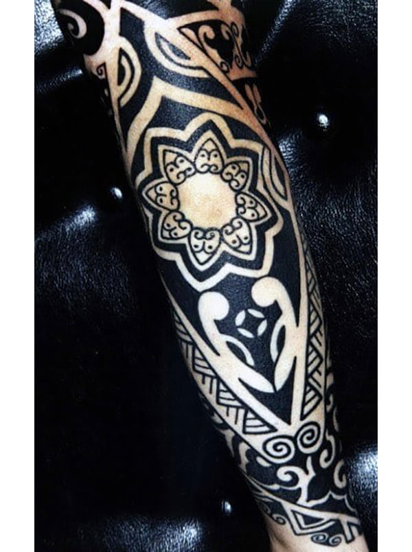 Intricate Black and White Traditional Elbow Tattoos