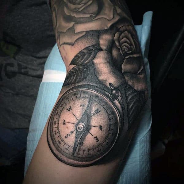 Compass Tattoo Over a Blooming Rose Traditional Elbow Tattoos