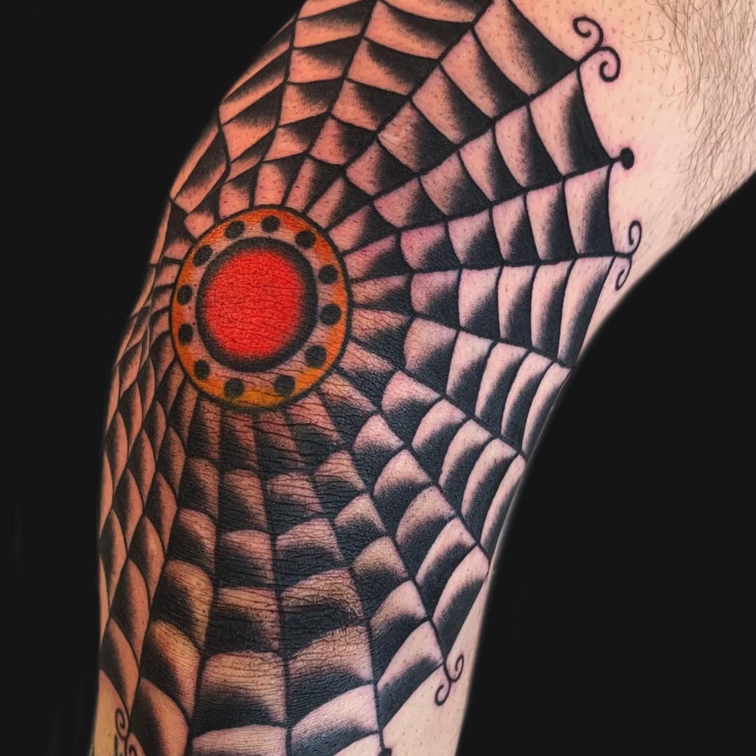 Web with Colored Center Disk Elbow Tattoos