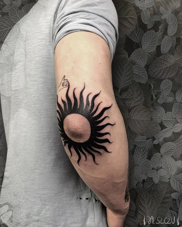 Sun with Curving Rays Around Elbow Tattos