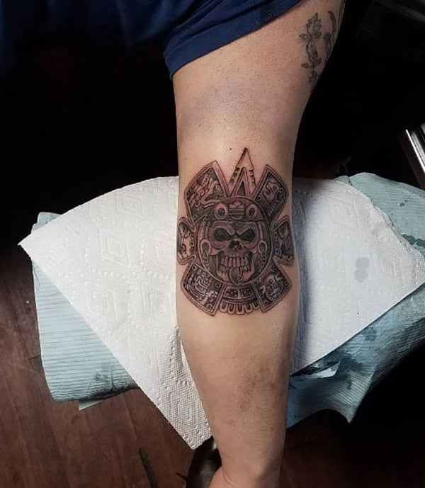 Center of Aztec Calendar Elbow Tattoos