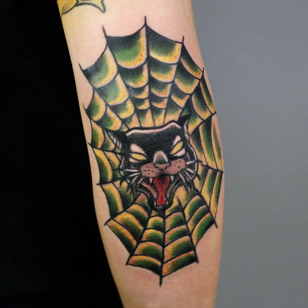 Cat Head Inside Spider Web Elbow Tattoos