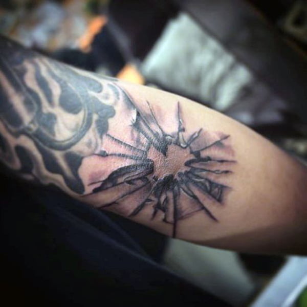 glass bullet hole tattoo