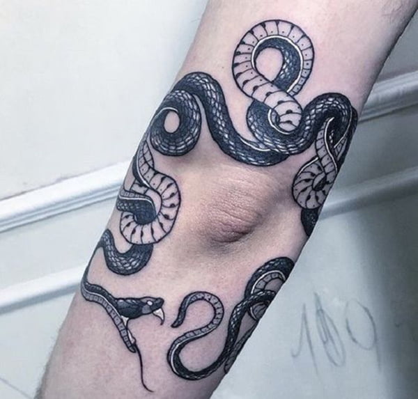 Looped Snake About to Bite Its Tail Elbow Tattoos