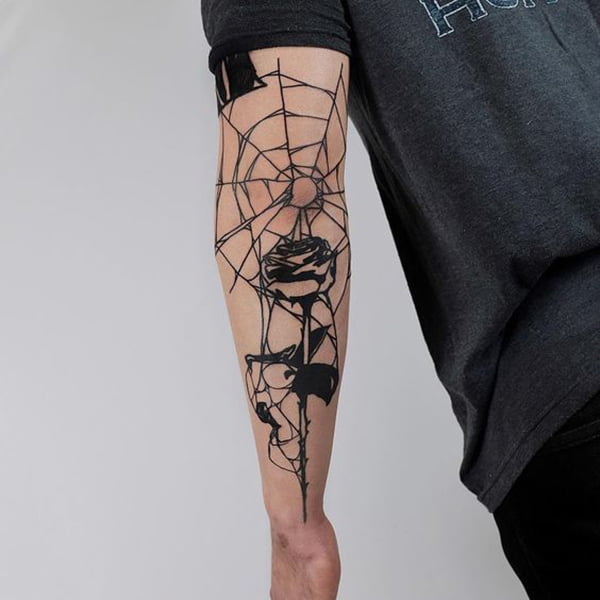 Spider Web Melds with Rose Elbow Tattoos