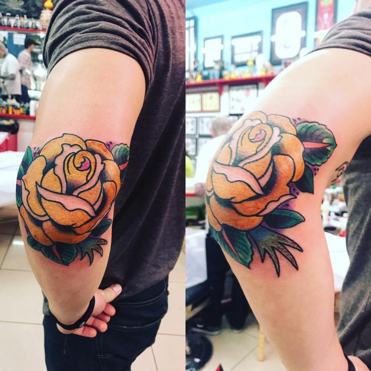 Yellow Rose with Green Leaves Elbow Tattoos