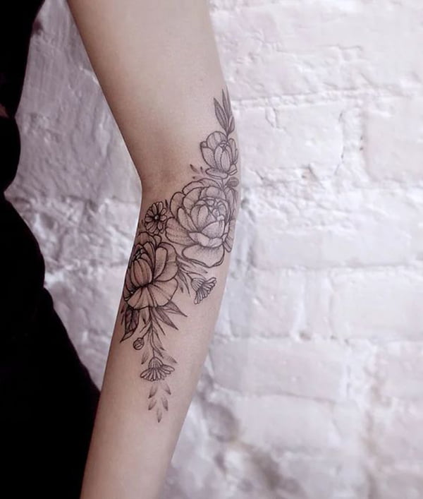 Blooming Roses and Other Flowers Elbow Tattoos with Deep Meaning
