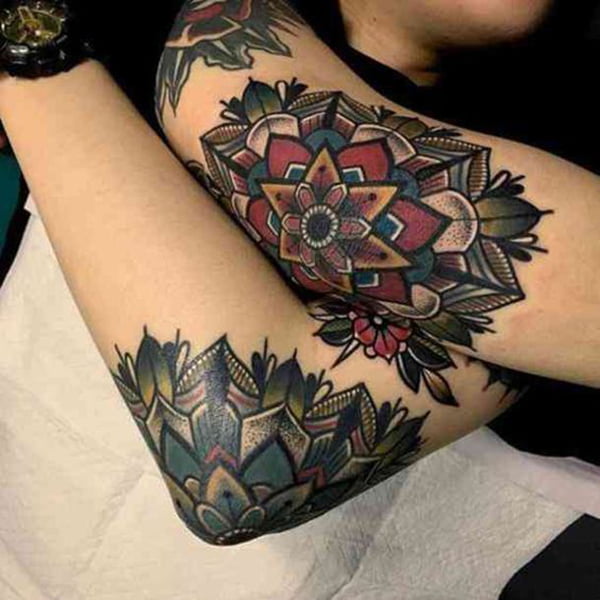Intricate Floral Pattern Filled with Color Elbow Tattoos