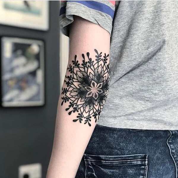 Floral Pattern Surrounded by Leaves Mandala Elbow Tattoo