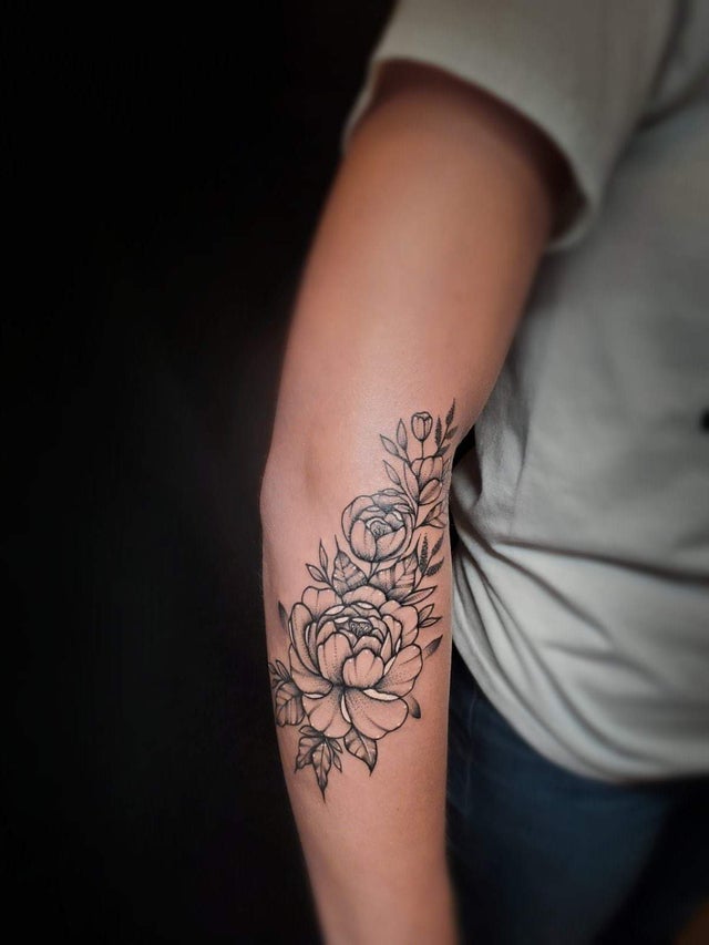 Line of Roses Along Elbow Tattoos