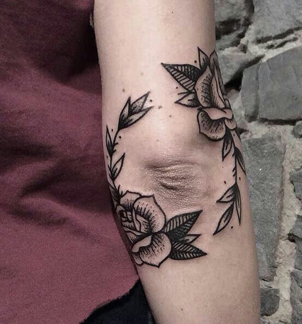 Roses and Branches Around Elbow Tattoos