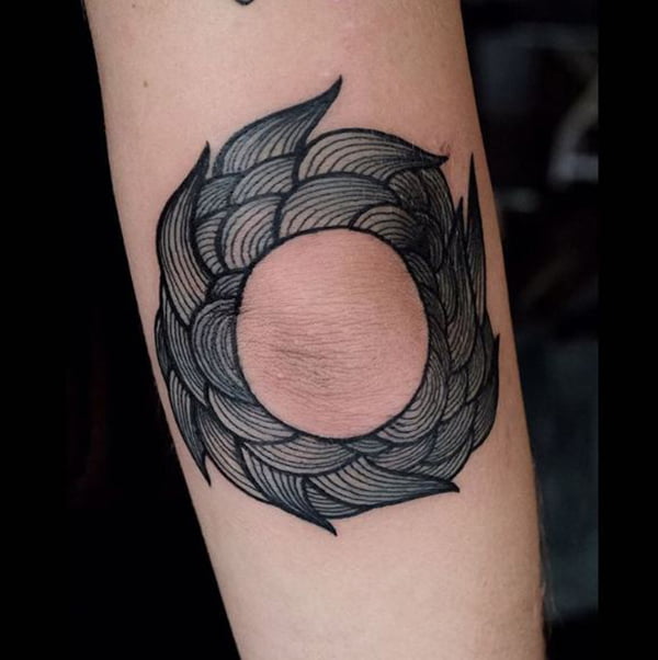 Circle Made of Stylized Waves Elbow Tattoos