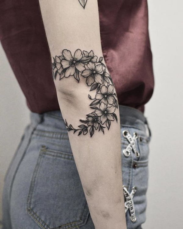 Crescent of Flowers and Leaves Elbow Tattoos