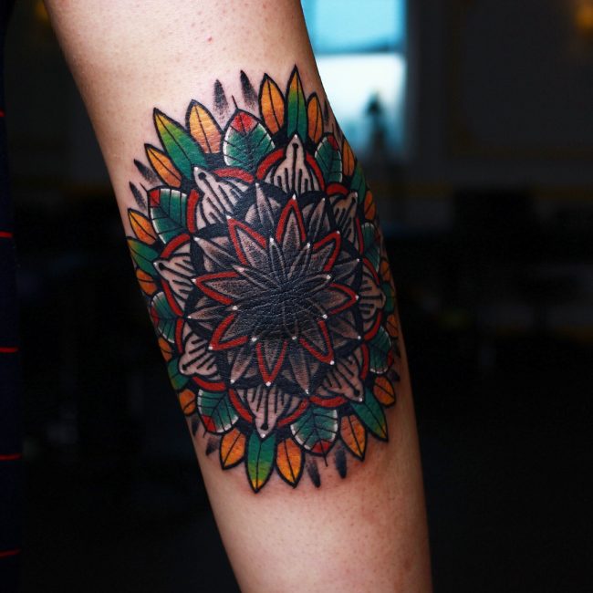 Flower Pattern with Accents of Color Elbow Tattoos