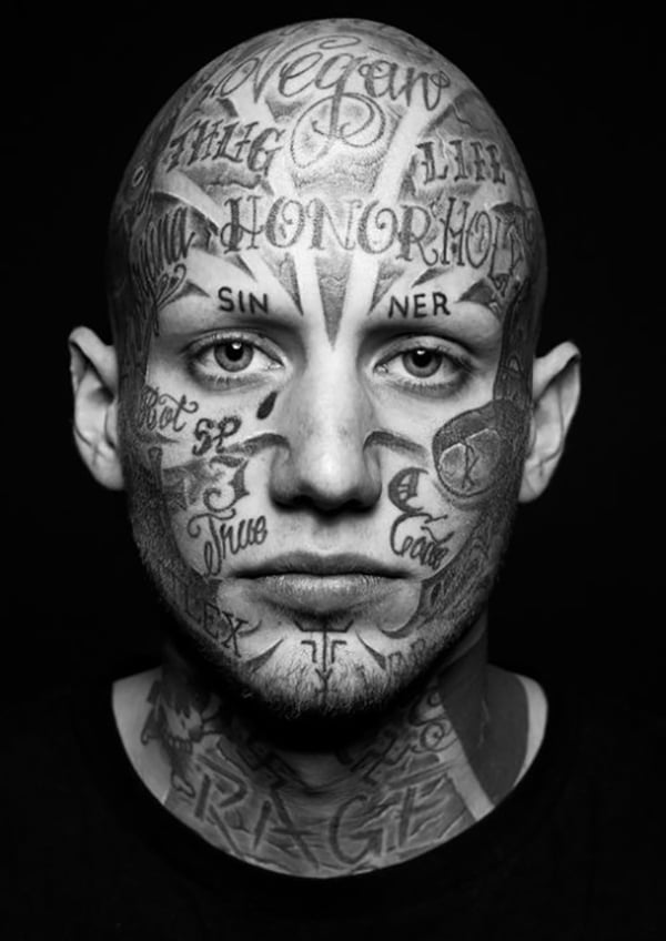 Tribal Lines Important Words Face Tattoo