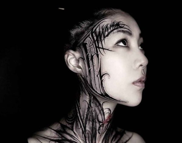 Gothic Tribal Face Length Face Tattoos
