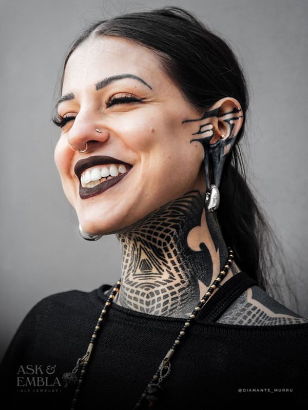 Black Tribal Lines Ear Face Tattoos