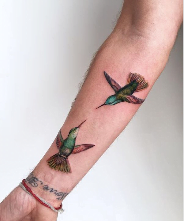 Colorful Conversing Hummingbird Pair Tattoo Design