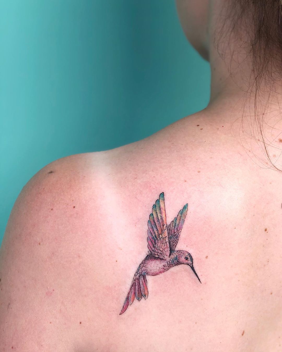 Small Hummingbird Tattoo Ideas on the Back from Tattoo Artist