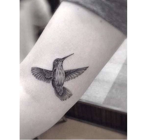 Delicately Detailed Hummingbird Tattoos Pointing to the Heart
