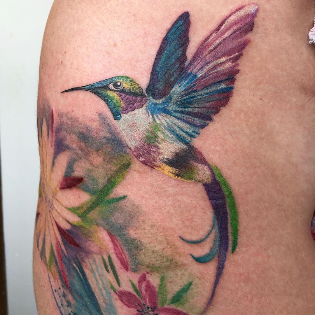 Artistic Blue, Green, Purple and Yellow Hummingbird Tattoos from Tattoo Artist