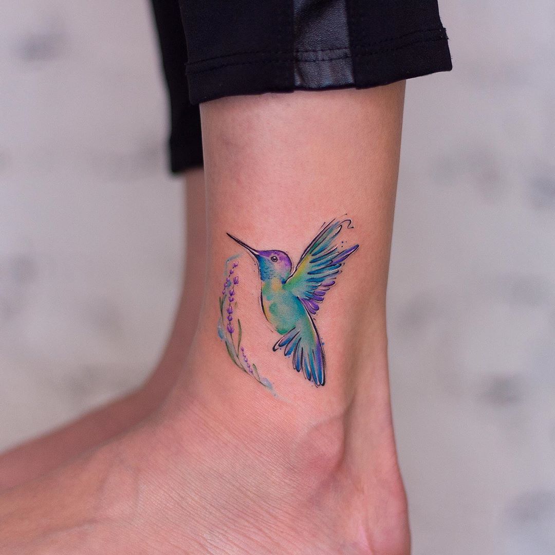 Pastel Hummingbird Tattoos Framed by a Lavender Sprig