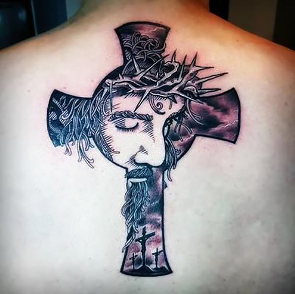 Celtic Cross Tattoo with a Portrait of Jesus and the Crosses of Calvary