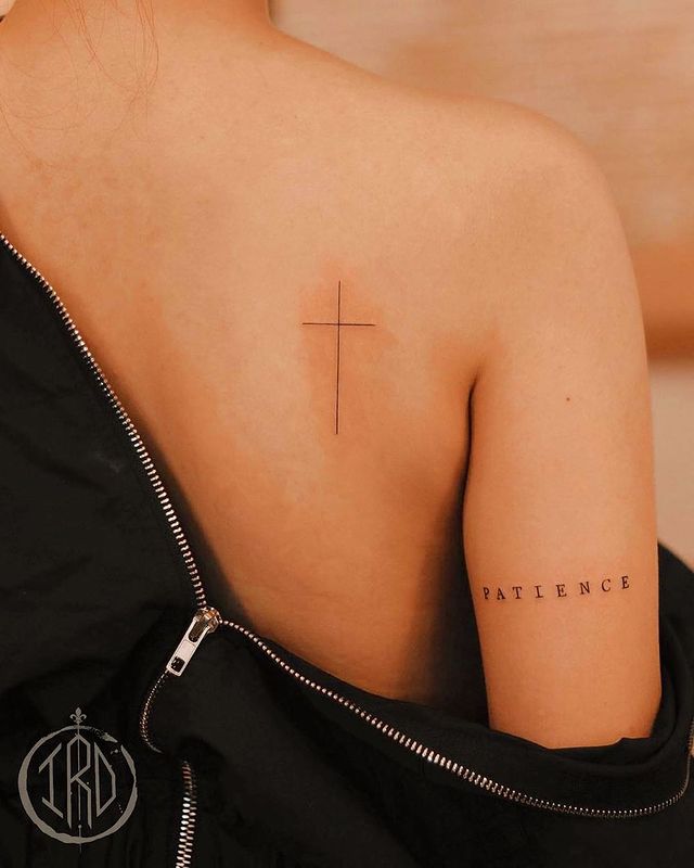 Thin Cross Tattoos on the Shoulder with Matching Word, Cross Tattoos, Cross Shoulder Tattoos