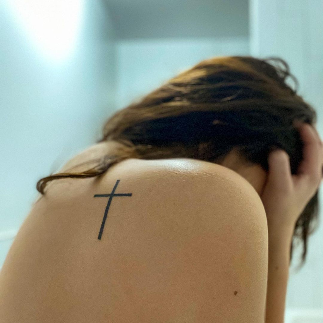 Simple Cross Tattoo Designs: Bold and Plain Black Cross Tattoos on the Shoulder