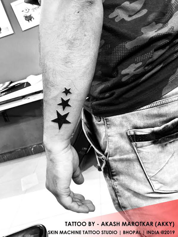 Tribal Star Tattoos on Forearm