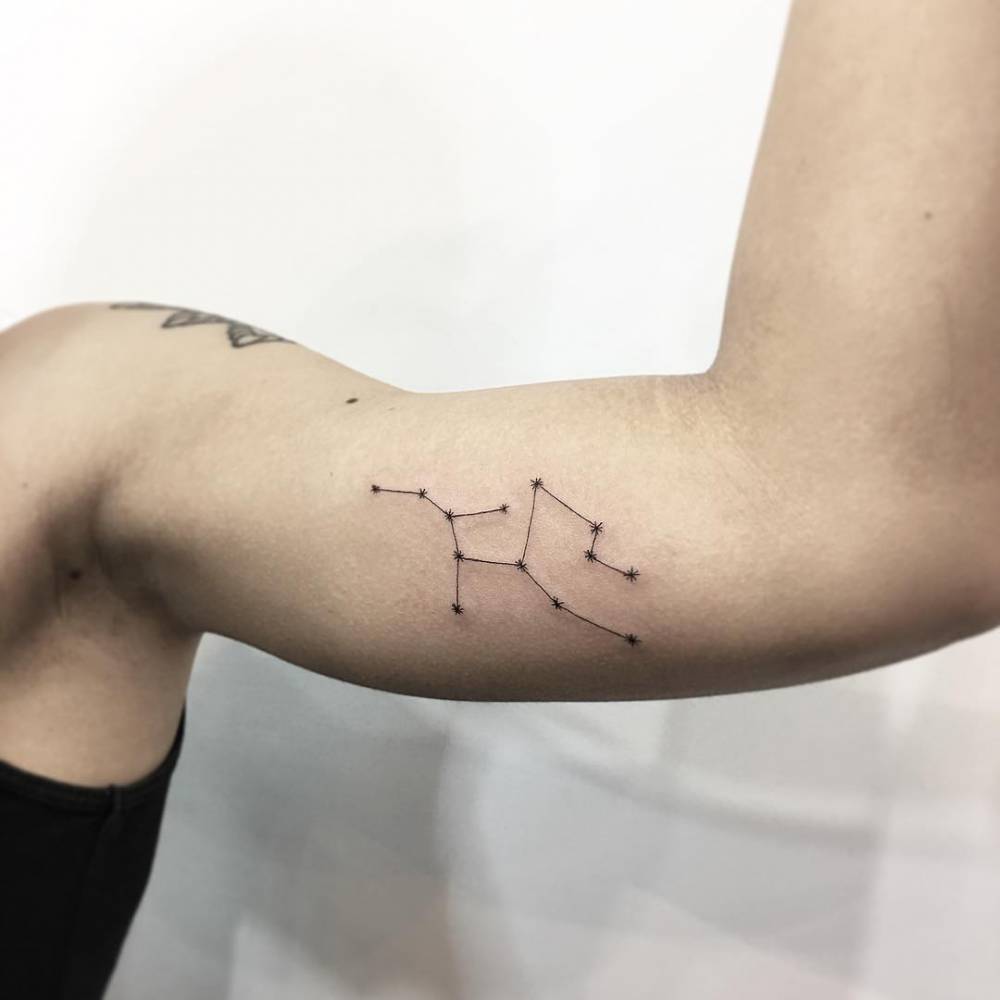 Shooting Star Tattoos on a Bicep