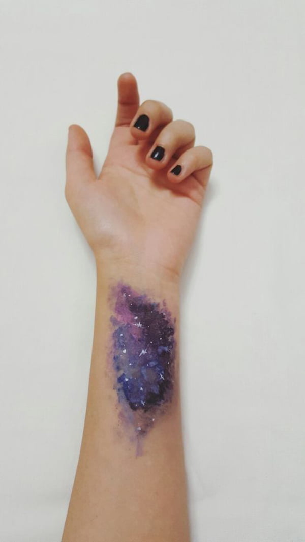 Watercolor Galaxy Shooting Star Tattoos on a Wrist