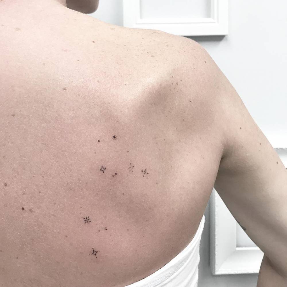 Simple Small Star Tattoo on Back for Men and Women