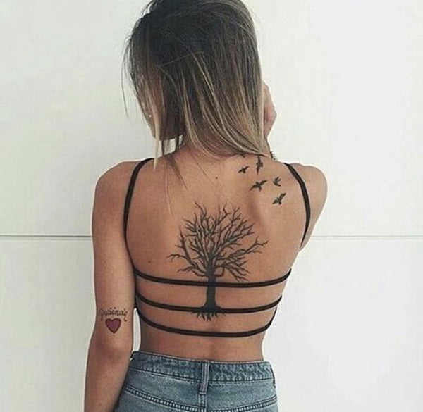 A Tree Grows Up Her Back