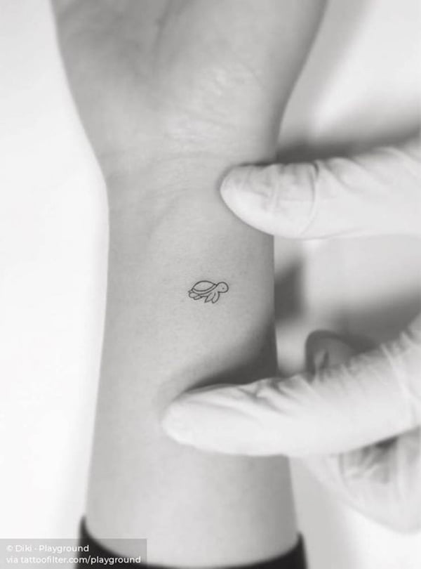 Tiny Delicate Turtle on Wrist Turtle Tattoos