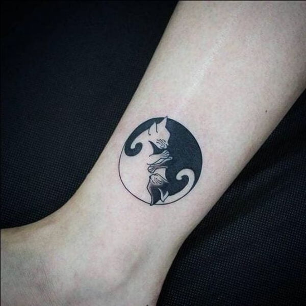 Black and White Yin-Yang Cuddling Cats Tattoo